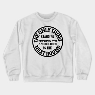 Between you and success is the next round. Crewneck Sweatshirt